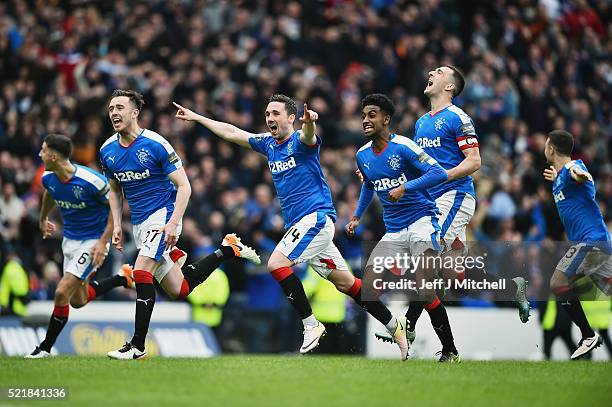 Rangers players celebtate after beating Celtic in a penalty shoot out during the William Hill Scottish Cup semi final between Rangers and Celtic at...