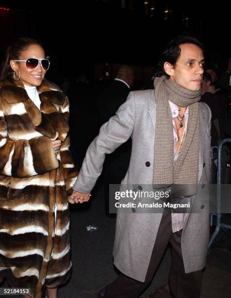 Jennifer Lopez and Marc Anthony arrive for the Jennifer Lopez Fall 2005 show during the Olympus Fashion Week in Bryant Park February 11, 2005 in New...