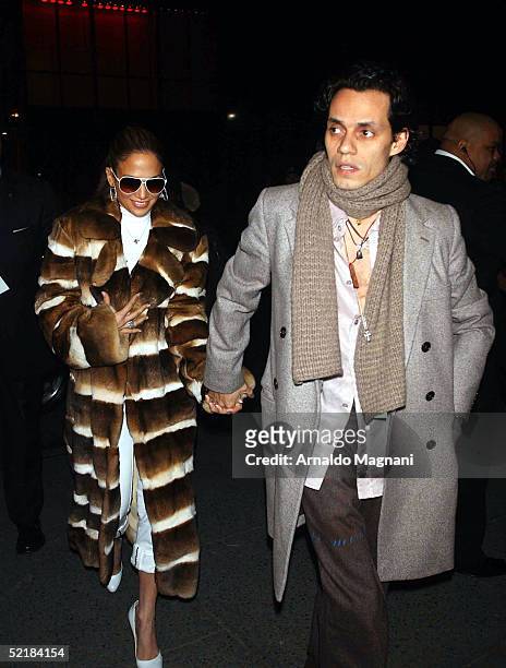 Jennifer Lopez and Marc Anthony arrive for the Jennifer Lopez Fall 2005 show during the Olympus Fashion Week in Bryant Park February 11, 2005 in New...