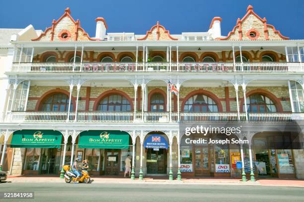 storefront and main street in simon's town - simonstown stock pictures, royalty-free photos & images