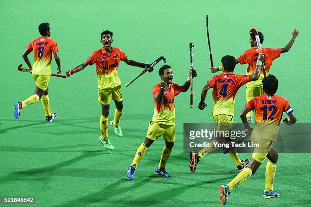 Sri Lanka players celebrate a goal against China during the final of round 1 of the 2016 Hockey World League at Sengkang Hockey Stadium on April 17,...
