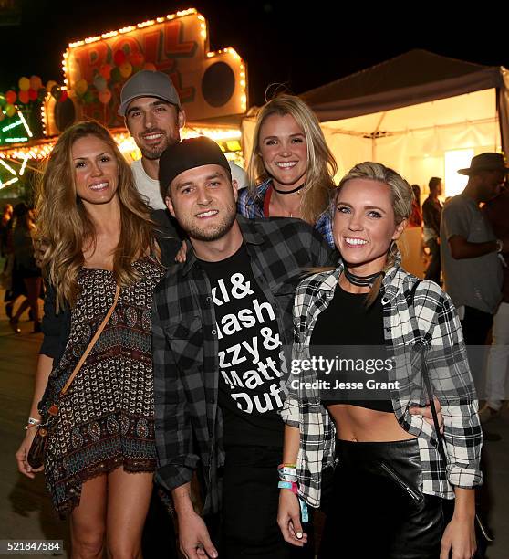 Party goers attend the Levi's Brand and RE/DONE Levi's presents NEON CARNIVAL with Tequila Don Julio on April 16, 2016 in Thermal, California.