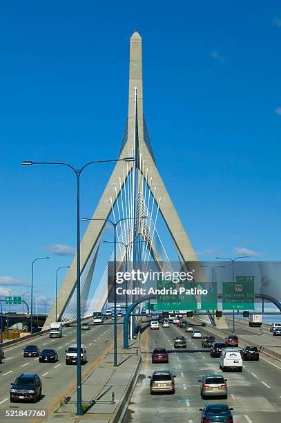 traffic over the leonard p. zakim bunker hill bridge - zakim bridge stock pictures, royalty-free photos & images