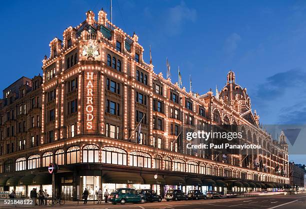 harrods in knightsbridge at dusk - harrods stock pictures, royalty-free photos & images