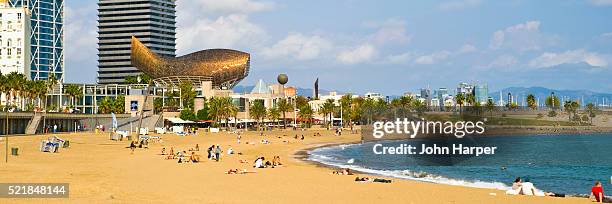 beach at port olimpic in barcelona - barcelona beach stock pictures, royalty-free photos & images