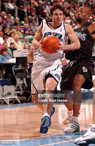 Raul Lopez of the Utah Jazz drives to the basket against the Minnesota Timberwolves on February 11, 2005 at the Delta Center in Salt Lake City, Utah....