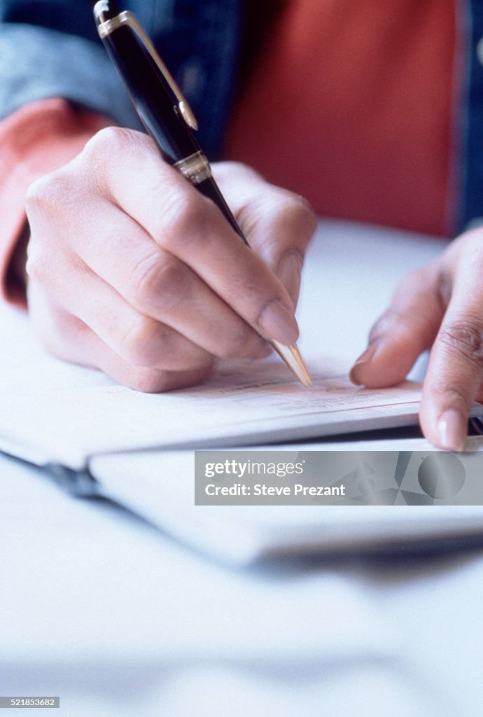 Man Write Check Writing A Check High-Res Stock Photo - Getty Images