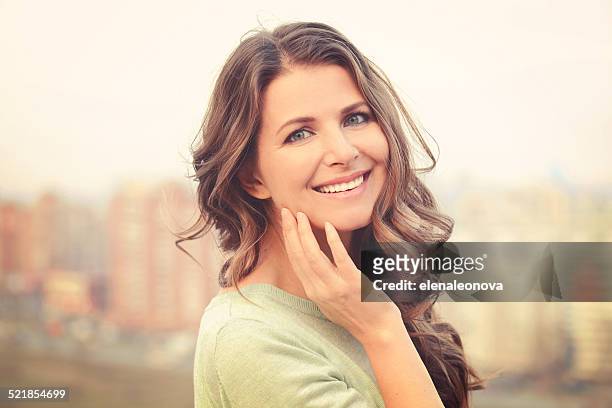beautiful woman - mid adult women stock pictures, royalty-free photos & images