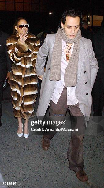 Jennifer Lopez and Marc Anthony arrive for the Jennifer Lopez Fall 2005 show during the Olympus Fashion Week in Bryant Park February 11, 2005 in New...