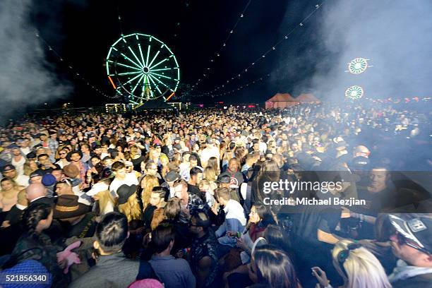 General view of the crowd at the Levi's Brand and RE/DONE Levi's presents NEON CARNIVAL with Tequila Don Julio on April 16, 2016 in Thermal,...