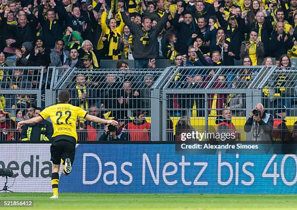 Christian Pulisic of Borussia Dortmund celebrates after scoring the opening goal during the Bundesliga match between Borussia Dortmund and Hamburger...