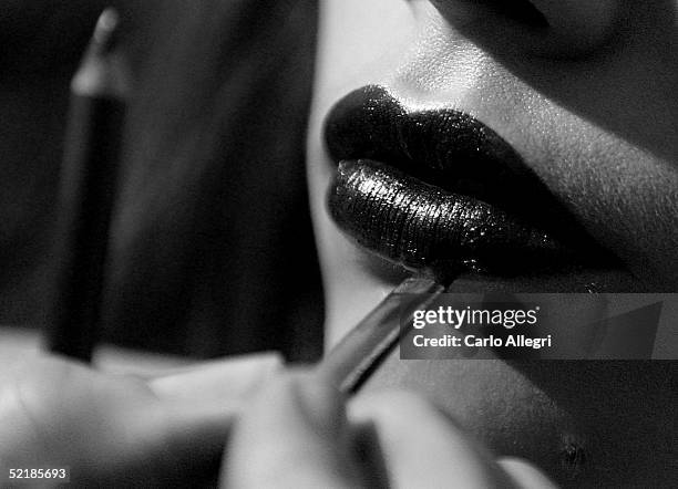 Unidentified model gets her make-up done backstage before the Esteban Cortazar Fall 2005 fashion show during Olympus Fashion Week at Bryant Park...