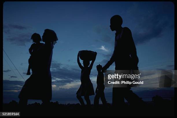 haitian family in silhouette - port au prince stock pictures, royalty-free photos & images