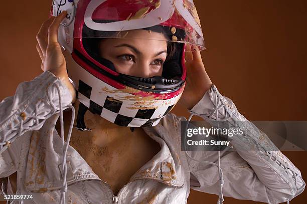 woman wearing motorbike helmet - motorbike helmet visor stock pictures, royalty-free photos & images