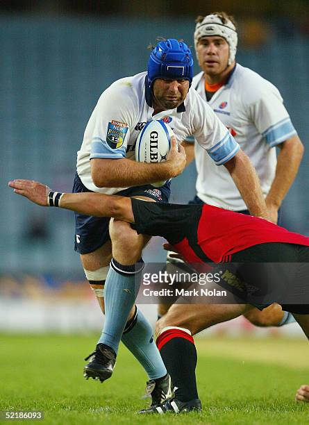 David Lyons of the Waratahs in action during the Super 12 trial match between the NSW Waratahs and the Crusaders at Aussie Stadium February 12, 2005...