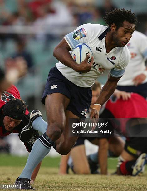 Lote Tuqiri of the Waratahs in action during the Super 12 trial match between the NSW Waratahs and the Crusaders at the Aussie Stadium February 12,...