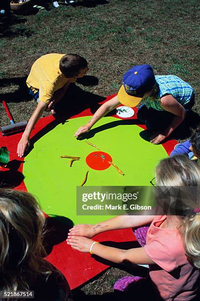 children racing banana slugs - prairie creek state park stock pictures, royalty-free photos & images