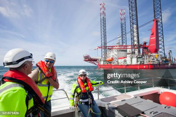 a health and safety inspector on a crew transfer vessel at the walney offshore wind farm - northern europe stock pictures, royalty-free photos & images