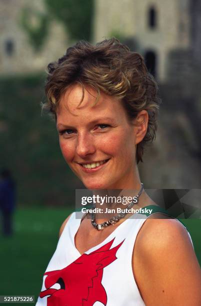 welsh woman at cardiff castle - welsh flag stock pictures, royalty-free photos & images