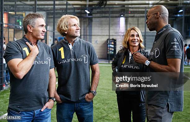 Laureus World Sports Academy member Mick Doohan,Robby Naish,Nadia Comaneci and Laureus World Sports Academy Chairman Edwin Moses during the Laureus...