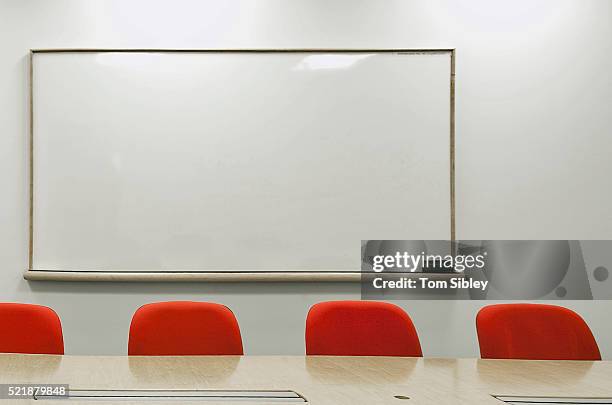 dry erase board and conference chairs - lavagna bianca foto e immagini stock