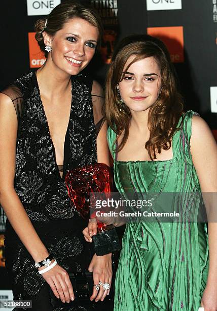Actresses Emma Watson , with the Orange Film of the Year award for "Harry Potter and the Prisoner of Azkaban," and Mischa Barton pose in the Awards...