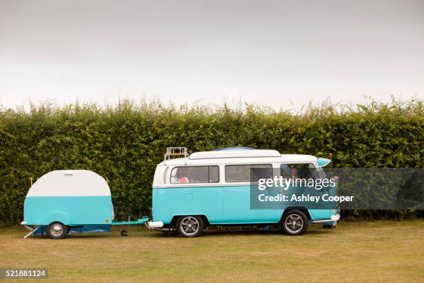 an old restored vw camper van. - vw camper van stock pictures, royalty-free photos & images