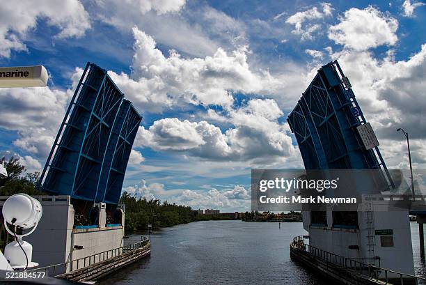 drawbridge open - zugbrücke stock-fotos und bilder