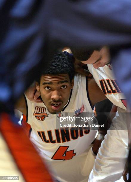 Luther Head and teammate Deron Williams of the Illinois Fighting Illini huddle during player introductions before a game against the Wisconsin...