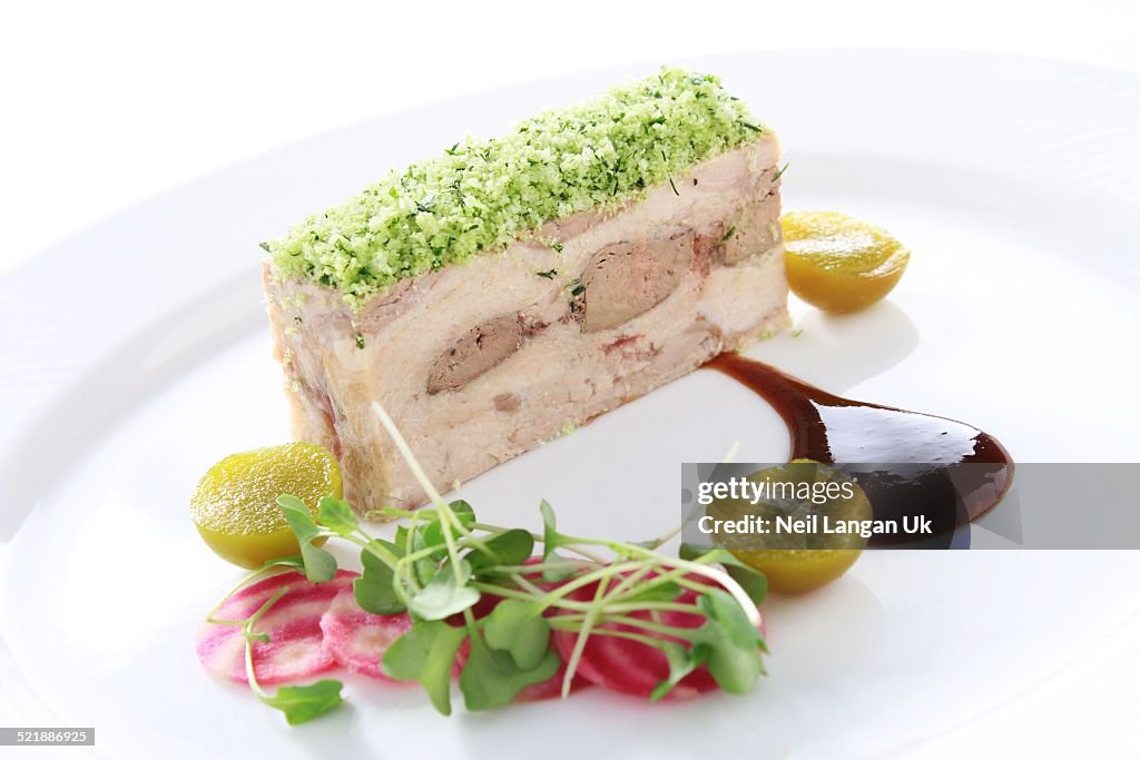 Plated duck terrine appetizer meal