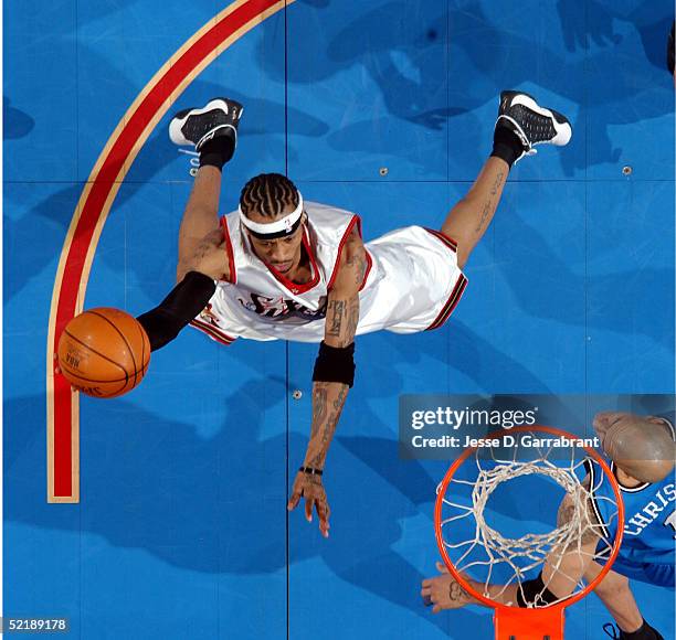 Allen Iverson of the Philadelphia 76ers drives to the hoop against the Orlando Magic on February 12, 2005 at the Wachovia Center in Philadelphia,...