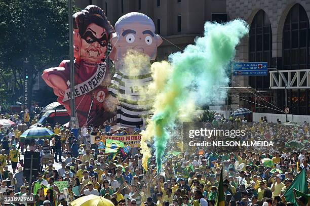 Activists supporting the impeachment of President Dilma Rousseff take part in a protest in Sao Paulo, Brazil on April 17, 2016. Rousseff risks being...