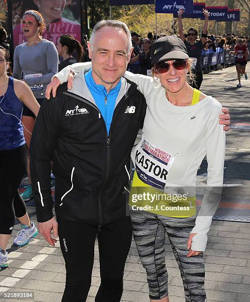 President and C.E.O. Of New York Road Runners Michael Capiraso and marathon runner Deena Kastor pose for a photo at the finsh line in Central Park on...