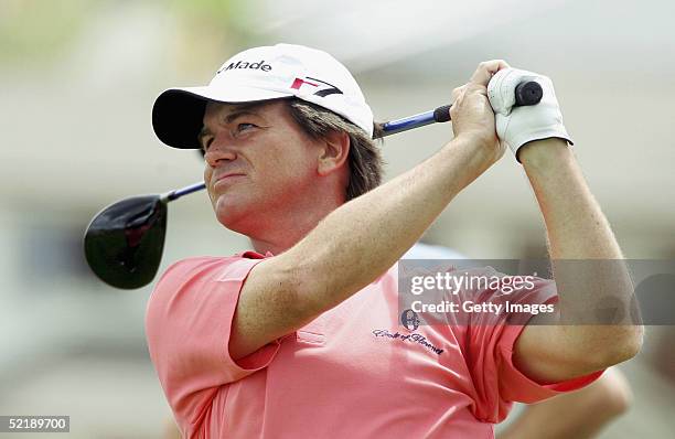 Miles Tunnicliff of England drives off the 5th tee during the final day of the Holden New Zealand Open at Gulf Harbour Country Club, February 13...