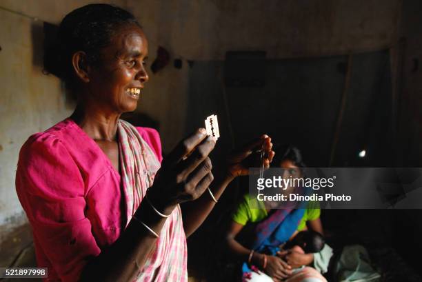 ho tribes midwife showing thread and razor, chakradharpur, jharkhand, india - chakradharpur stock pictures, royalty-free photos & images