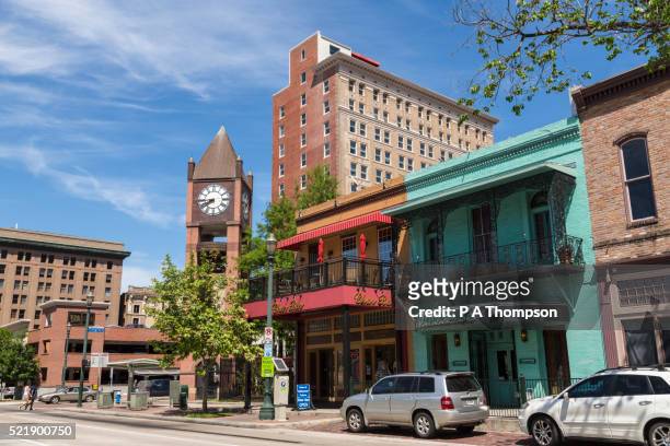market square clock tower, houston historic district - houston texas stock-fotos und bilder
