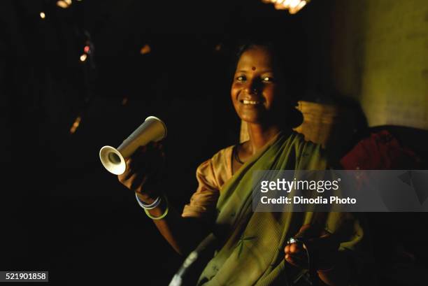 ho tribes woman holding instrument of foetus, chakradharpur, jharkhand, india - chakradharpur stock pictures, royalty-free photos & images