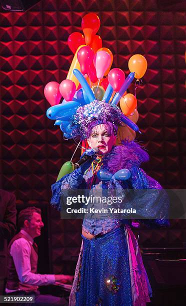 Taylor Mac performing at Joe's Pub at the Public, with Matt Ray on piano, February 25, 2013. Costume by Machine Dazzle