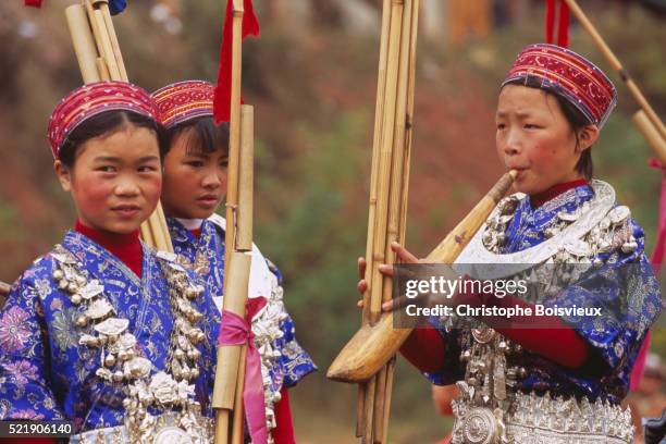 young lusheng players - flute players bildbanksfoton och bilder