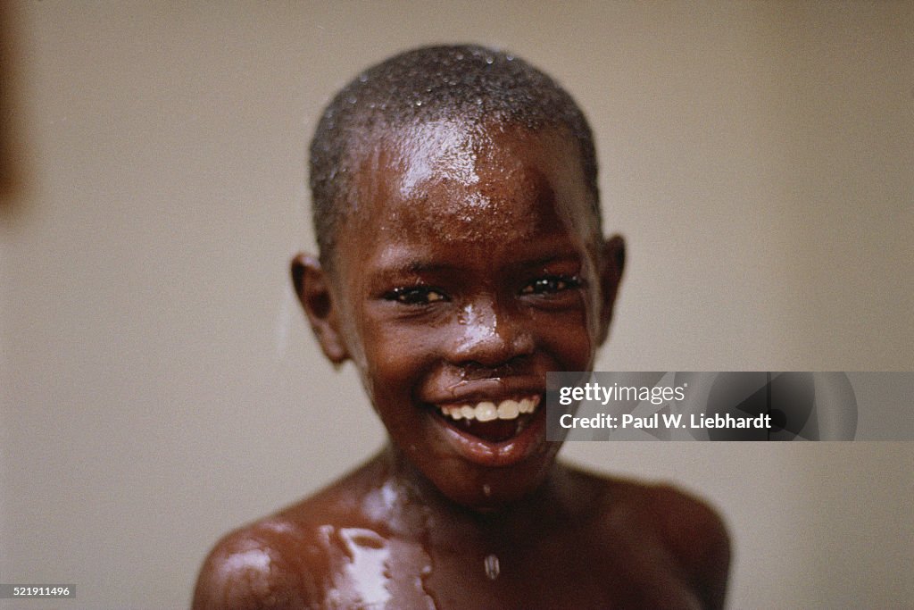 Wet Malian Boy Laughing