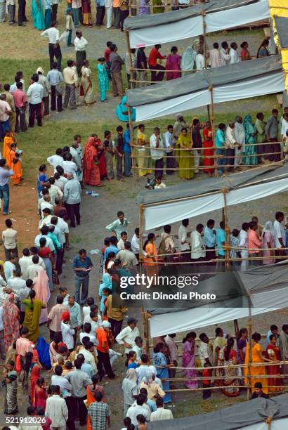 voters standing in queue to cast vote bombay mumbai, maharashtra, india - voting india stock pictures, royalty-free photos & images