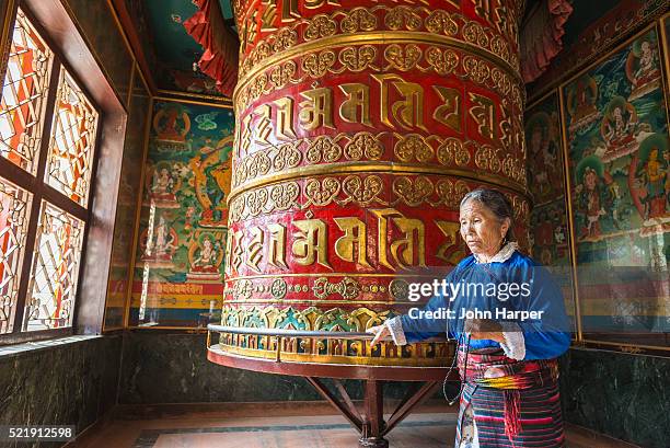 prayer wheel, boudhanath stupa, nepal - nepal women stock pictures, royalty-free photos & images