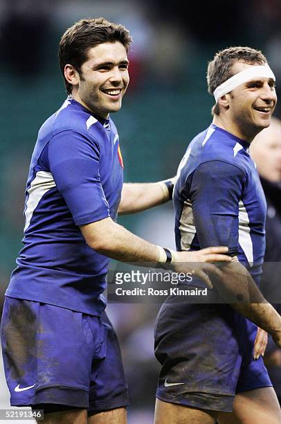 Dimitri Yachvili celebrates with Yann Delaigue of France during the RBS Six Nations International between England and France at Twickenham Stadium on...