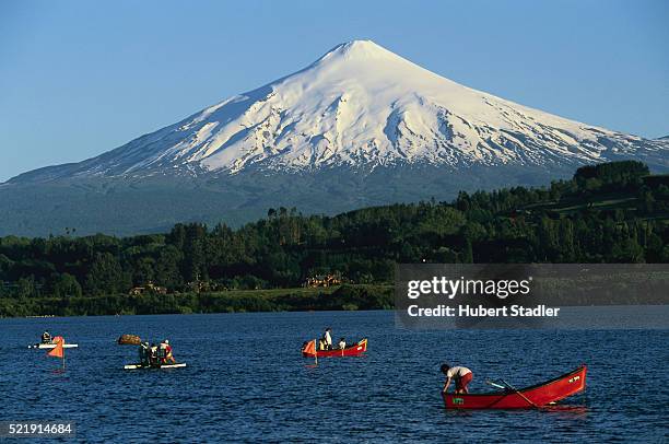 people on a lake near villarica - villarrica stock pictures, royalty-free photos & images