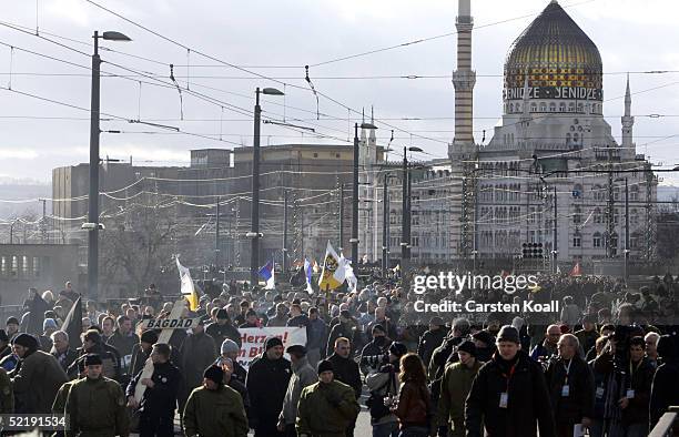 Neo-Nazis march during the 60th anniversary of the fire-bombing of Dresden by Allied bombers during World War II on February 13, 2005 in Dresden,...