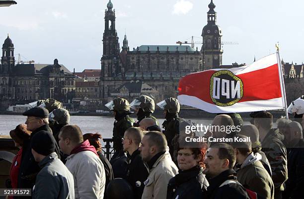 Neo-Nazis march during the 60th anniversary of the fire-bombing of Dresden by Allied bombers during World War II on February 13, 2005 in Dresden,...