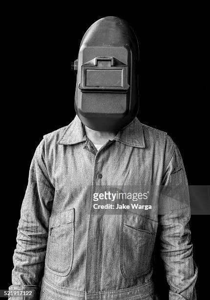 black and white artistic welder portrait - welding mask stock pictures, royalty-free photos & images