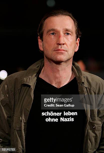 Actor Peter Lohmeyer arrives wearing a T shirt saying 'Live Better Without Nazis' at the "Sophie Scholl" Premiere during the 55th annual Berlinale...