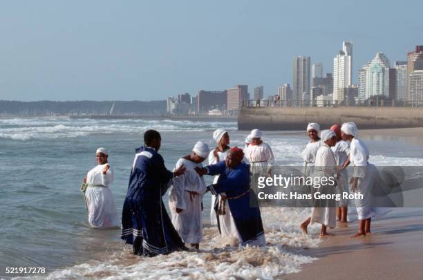 baptism on northern beach, durban - religiöses fest stock-fotos und bilder