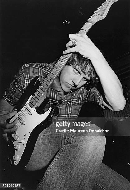 American actor Gary Busey with a Fender Stratocaster guitar, circa 1980.